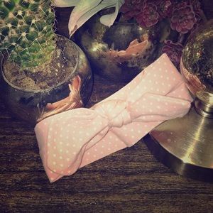 Light pink polka dotted headband for infant
